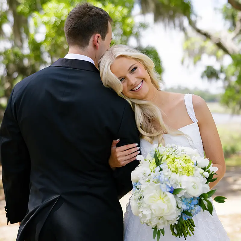Bride and groom embracing Bride and groom embracing